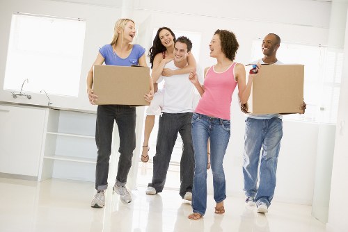 Customer moving boxes safely inside a self storage facility