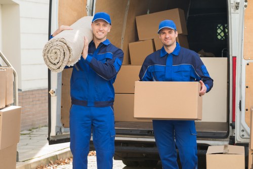 Furniture and boxes being transported with a man and van service