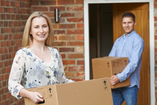 Packed boxes and furniture prepared for storage in West London