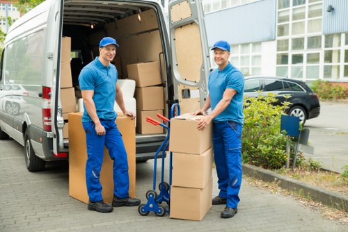Packed office furniture and equipment ready for relocation